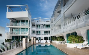 Pool Deck Patio & Heated Outdoor Pool w/ Pool bar