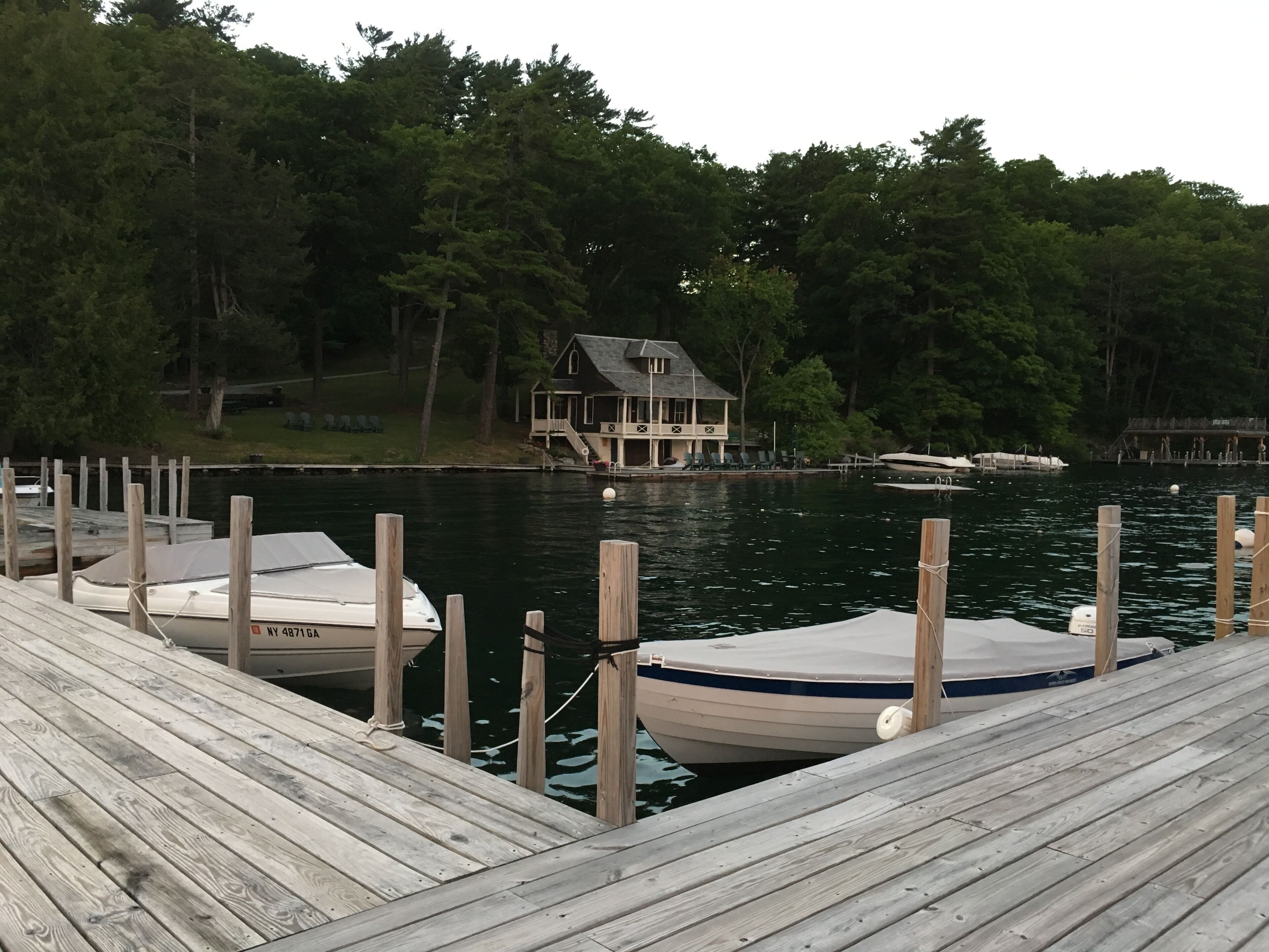 Shared water front with clubhouse in background and expansive decking