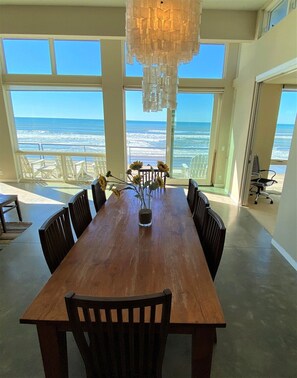 Dining table for 8-12 (leaf and extra chairs available in closet)