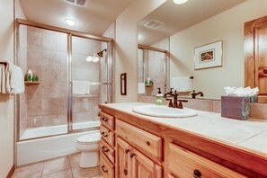 Bathtub, hair dryer, towels