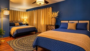 A bedroom with two beds, a large rug, a floor lamp, and a vase with dried plants. - Sequoia River House - 2 Decks on the River, close to SNP,  7 acres  (Three Rivers)