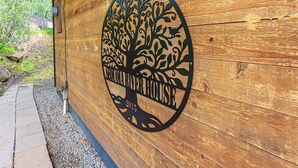 A wooden wall with a circular logo featuring a tree design and the text "WILSONDALE RIVER HOUSE 2015". - Sequoia River House - 2 Decks on the River, close to SNP,  7 acres  (Three Rivers)