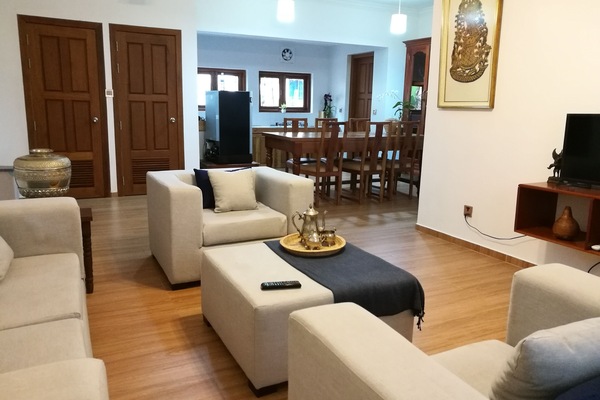 Private living, dinning table and kitchen