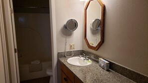 Shower, hair dryer, towels, toilet paper