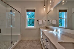 Combined shower/tub, hair dryer, towels, soap
