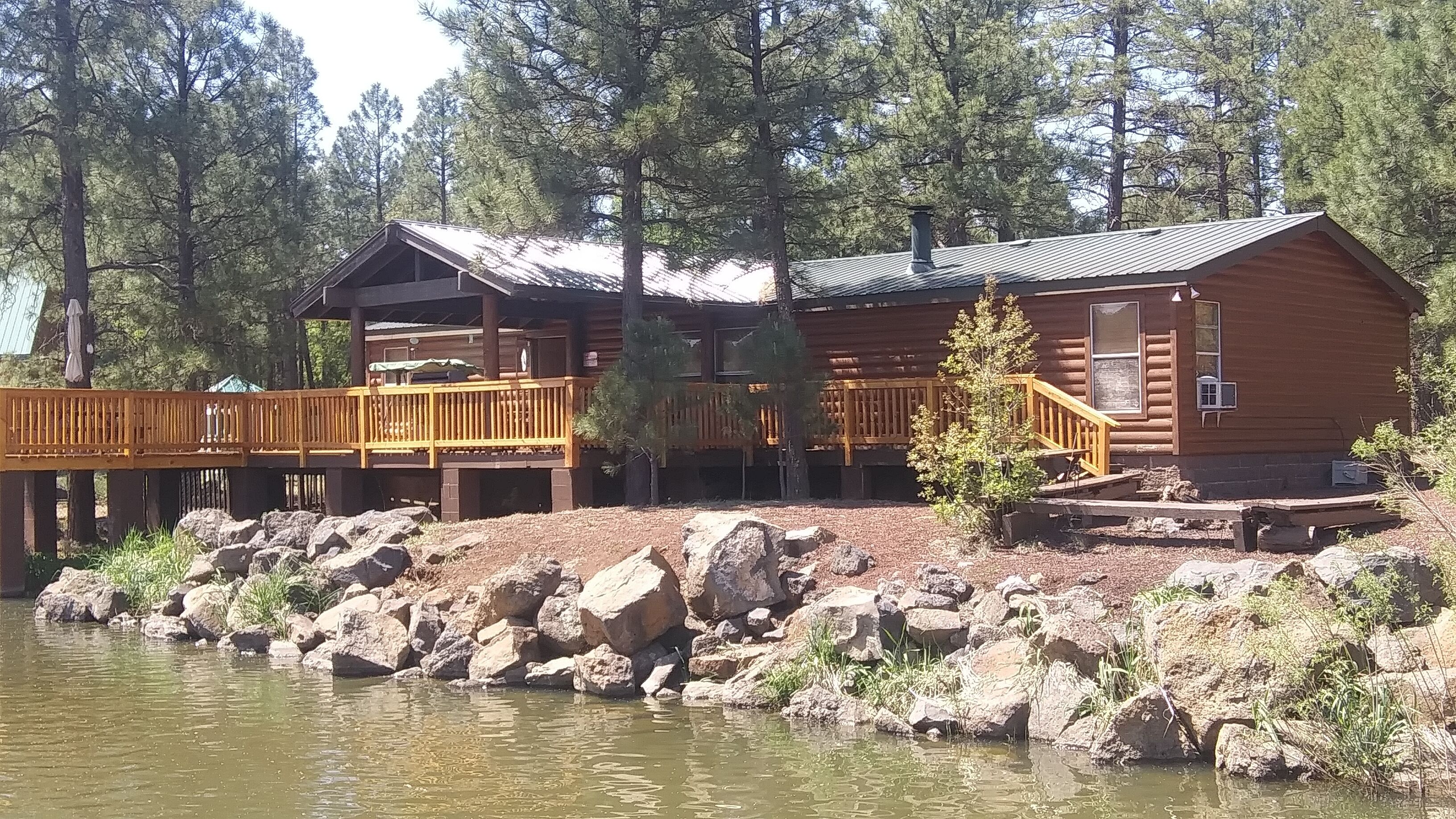 LAKEFRONT CABIN ON RAINBOW LAKE with 5 Boats, 3 Kayaks, a Canoe and a 36 ft Pier