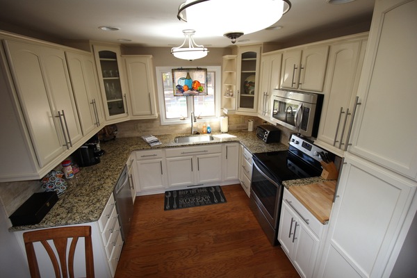 New kitchen area it al stainless appliances and lots of counter space