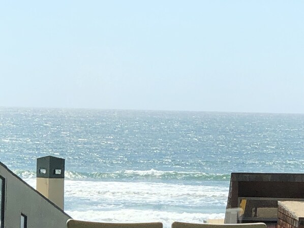Plage à proximité, chaise longue, serviettes de plage