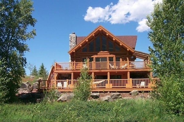 2000 square feet of wrap around decks with awesome views! Welcome to Paradise