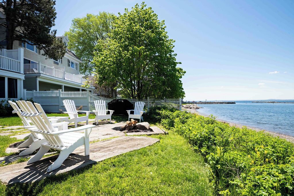 Relax by the waterside fire pit