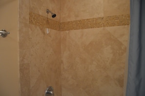 Combined shower/tub, hair dryer, towels, soap