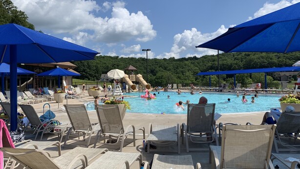 A pool area with lounge chairs and umbrellas, a slide, and a water play area. - Newly remodeled, Located in Galena Territories. Small dogs OK under 25 LBS  (Galena)