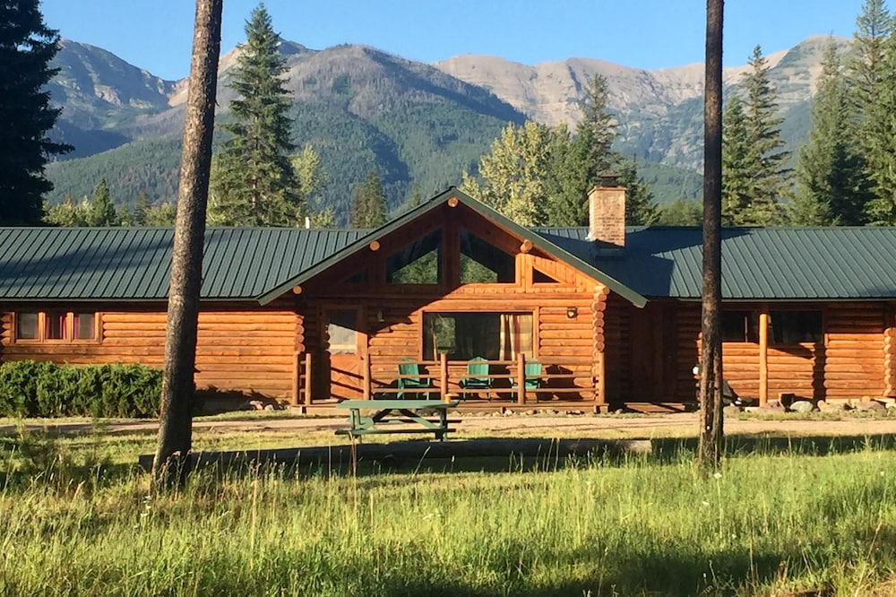 Log Cabin with Stunning Mountain Views near Swan River and Holland Lake.