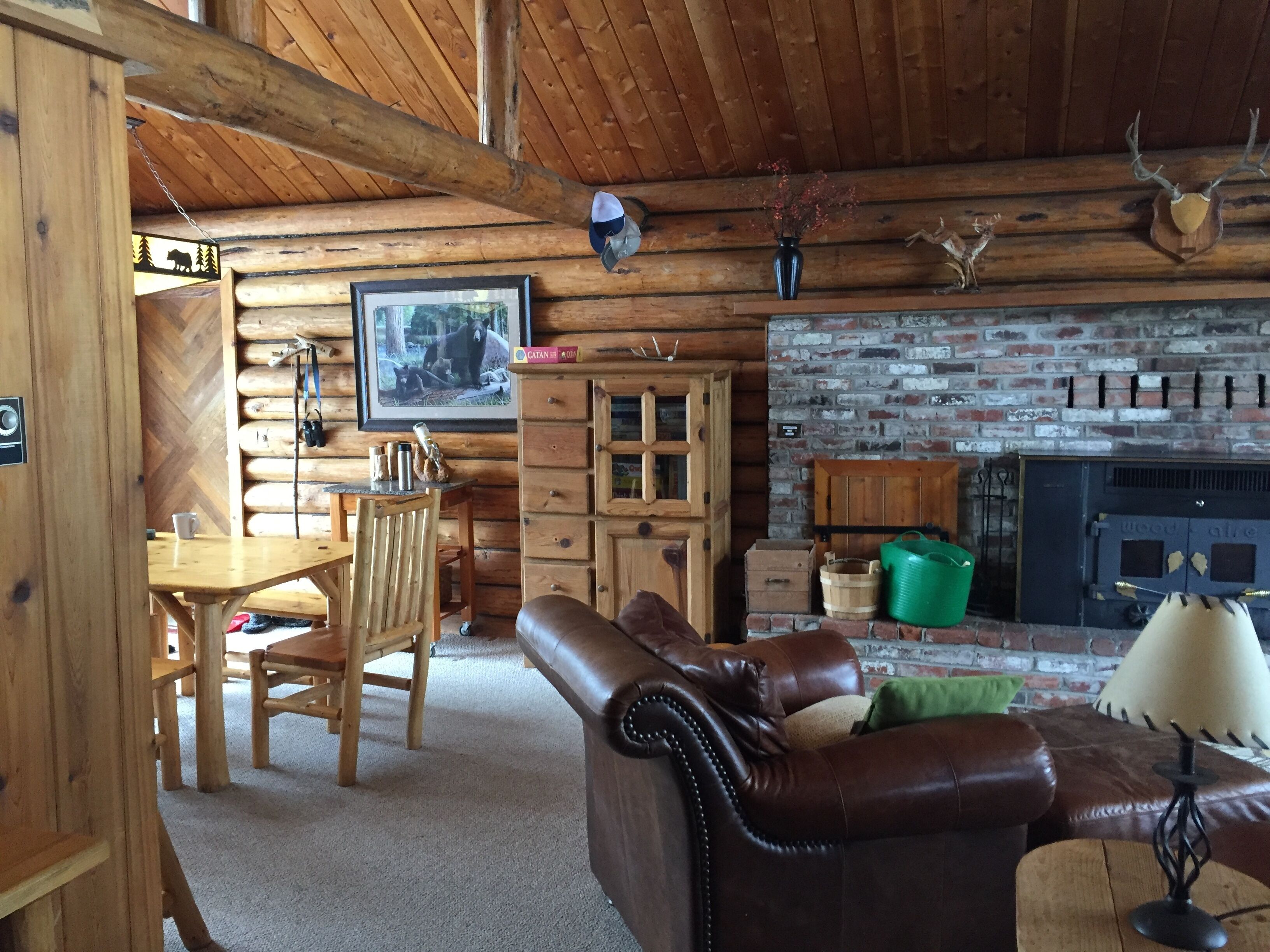 Log Cabin with Stunning Mountain Views near Swan River and Holland Lake.