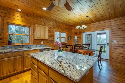 Cozy Log Home with Hot Tub Minutes to Downtown, Breweries & Trails!