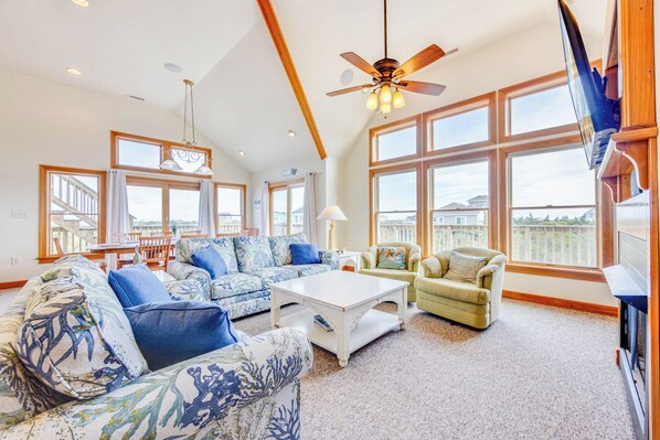 Televisión, reproductor de DVD, libros y estéreo 