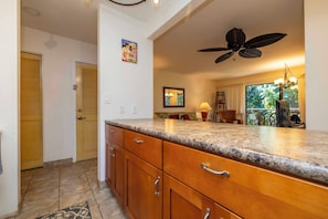 Enjoy meals in the kitchen with a view of the surrounding greenery.