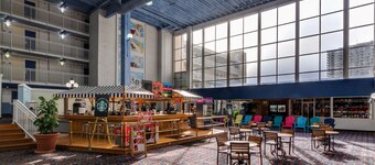 Tranquil waterfront condo with pools, gym, arcade & ice rink