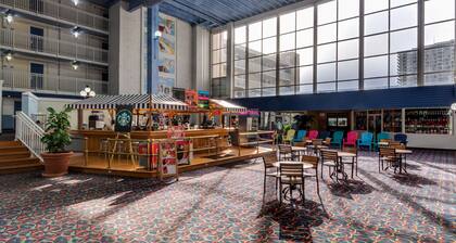 Tranquil waterfront condo with pools, gym, arcade & ice rink