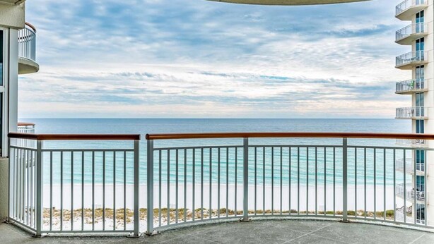 A balcony with a view of the ocean and beach. - Beach Colony West 8E Beautiful Gulf Views from over sized balcony (Navarre)