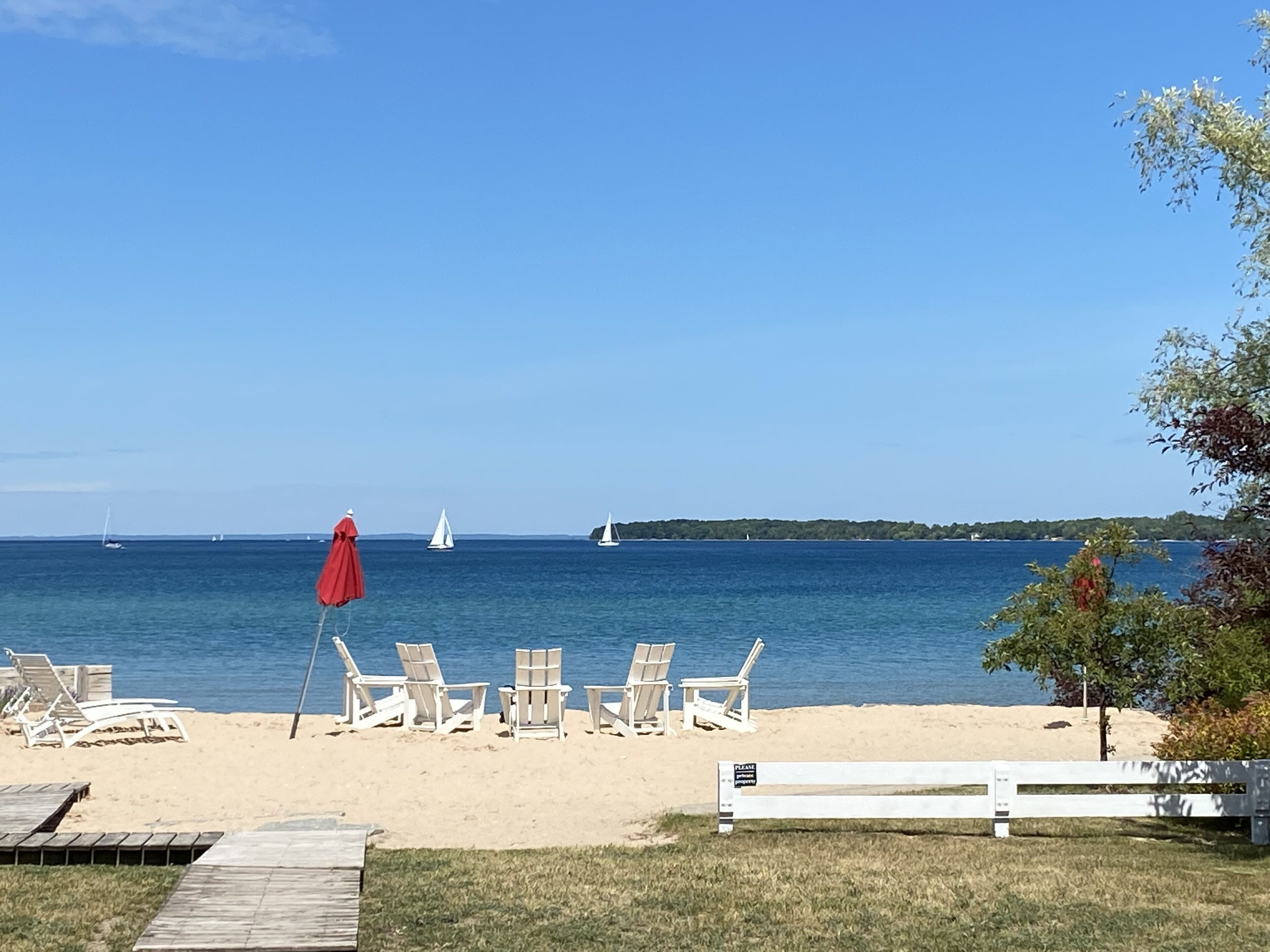 On the beach, sun loungers, beach towels