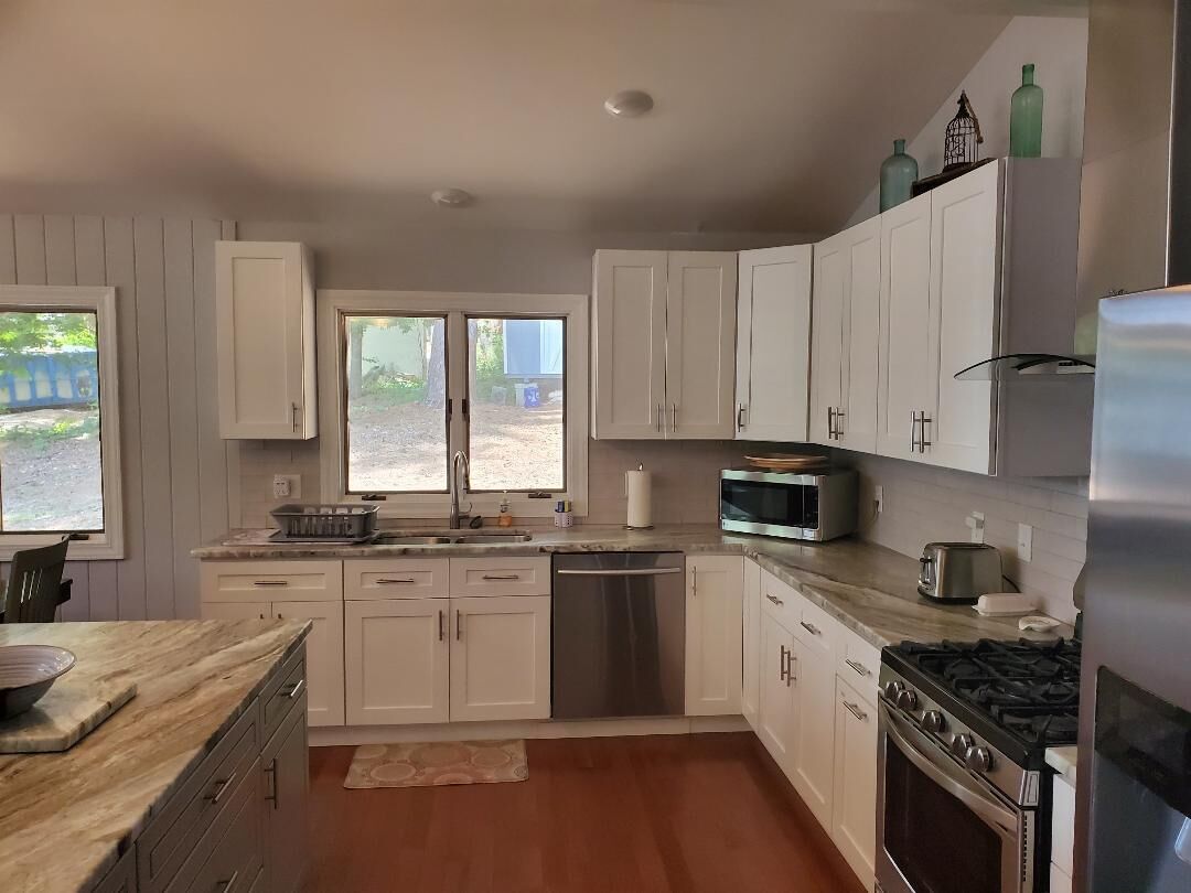 Main lake view, beach and dock at Lake Gaston