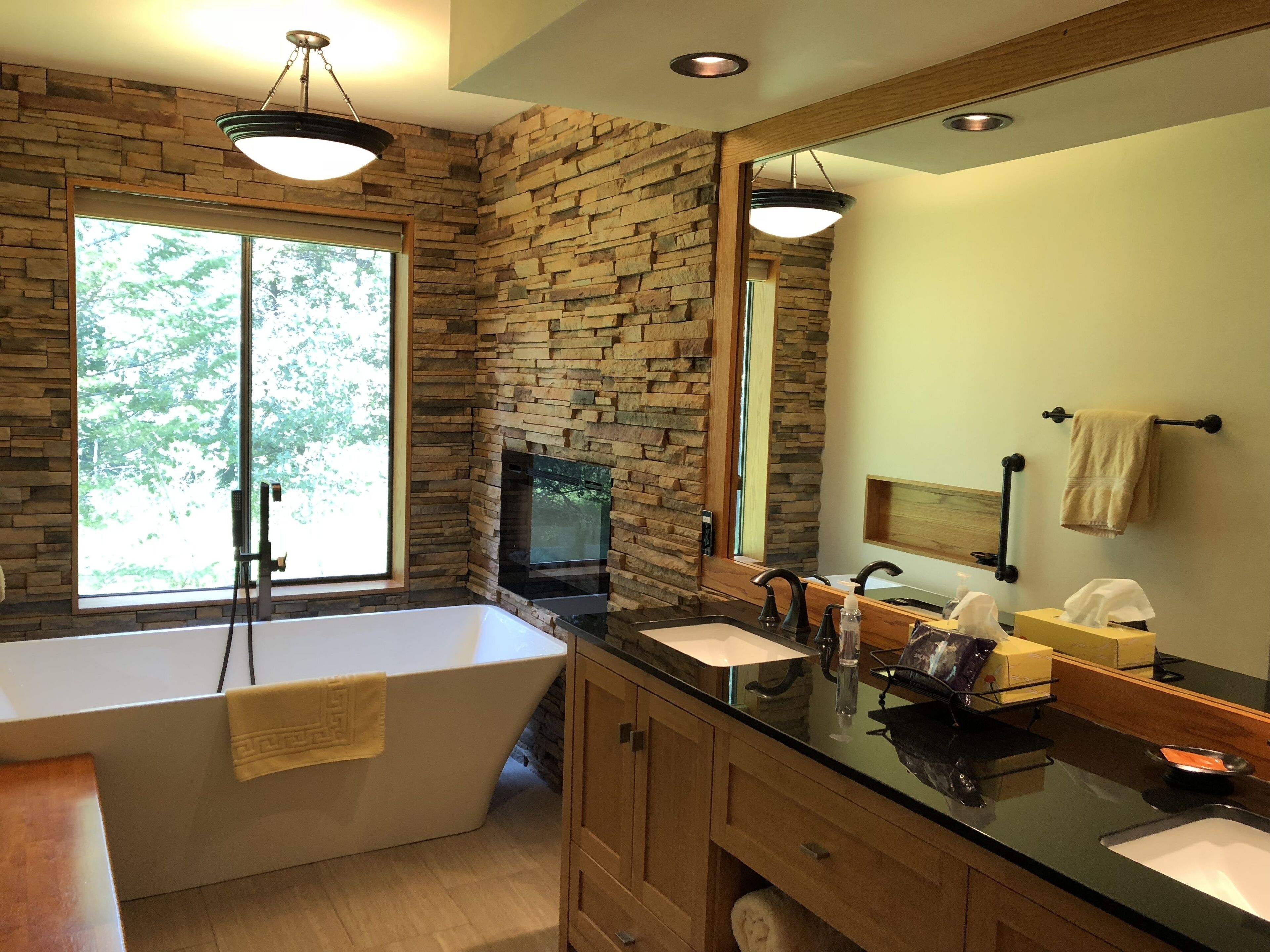 Combined shower/tub, hair dryer, towels, soap