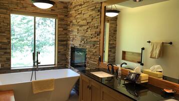 Combined shower/tub, hair dryer, towels, soap