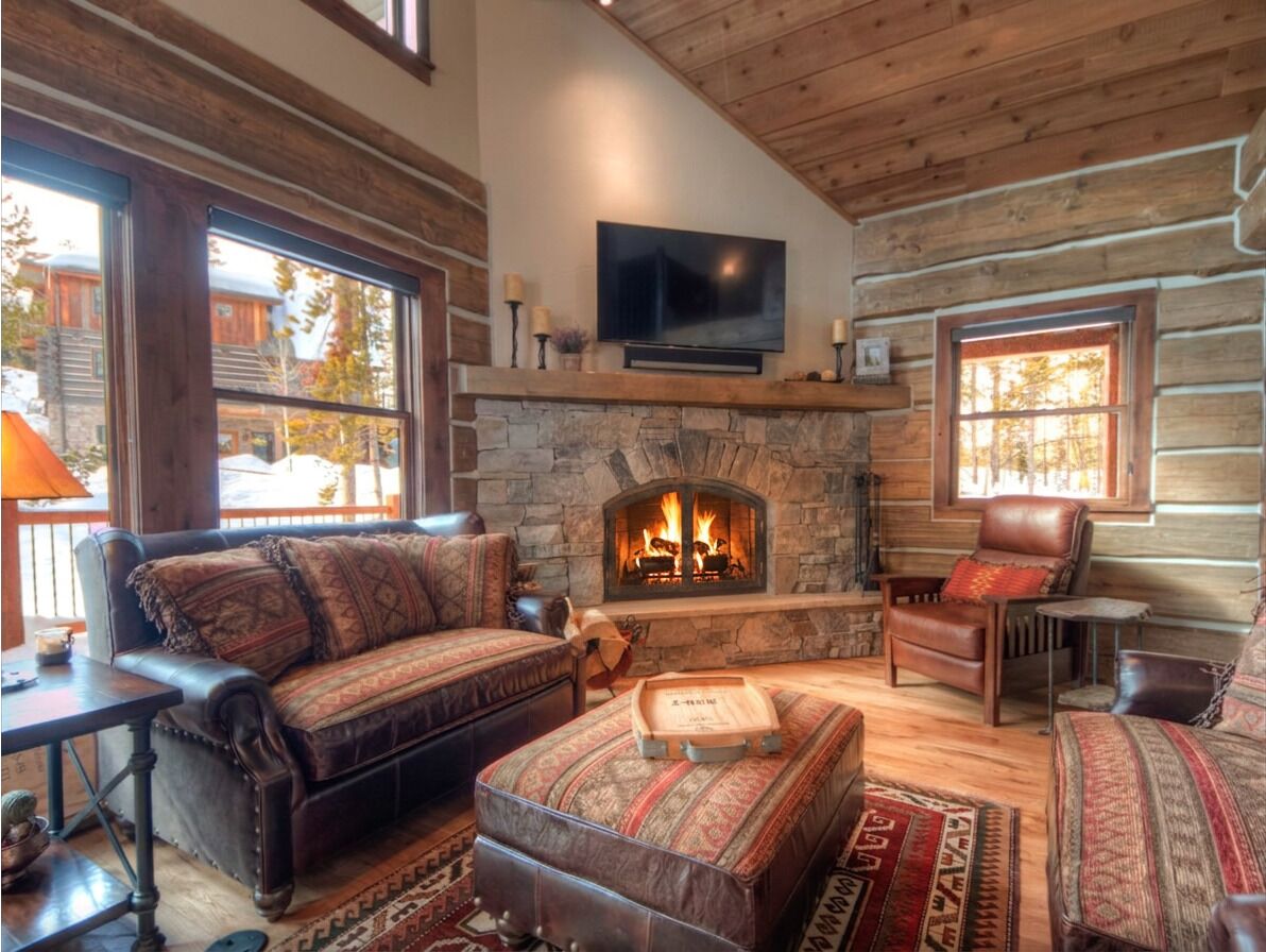 Cozy up by the wood burning fire in the upper living room!