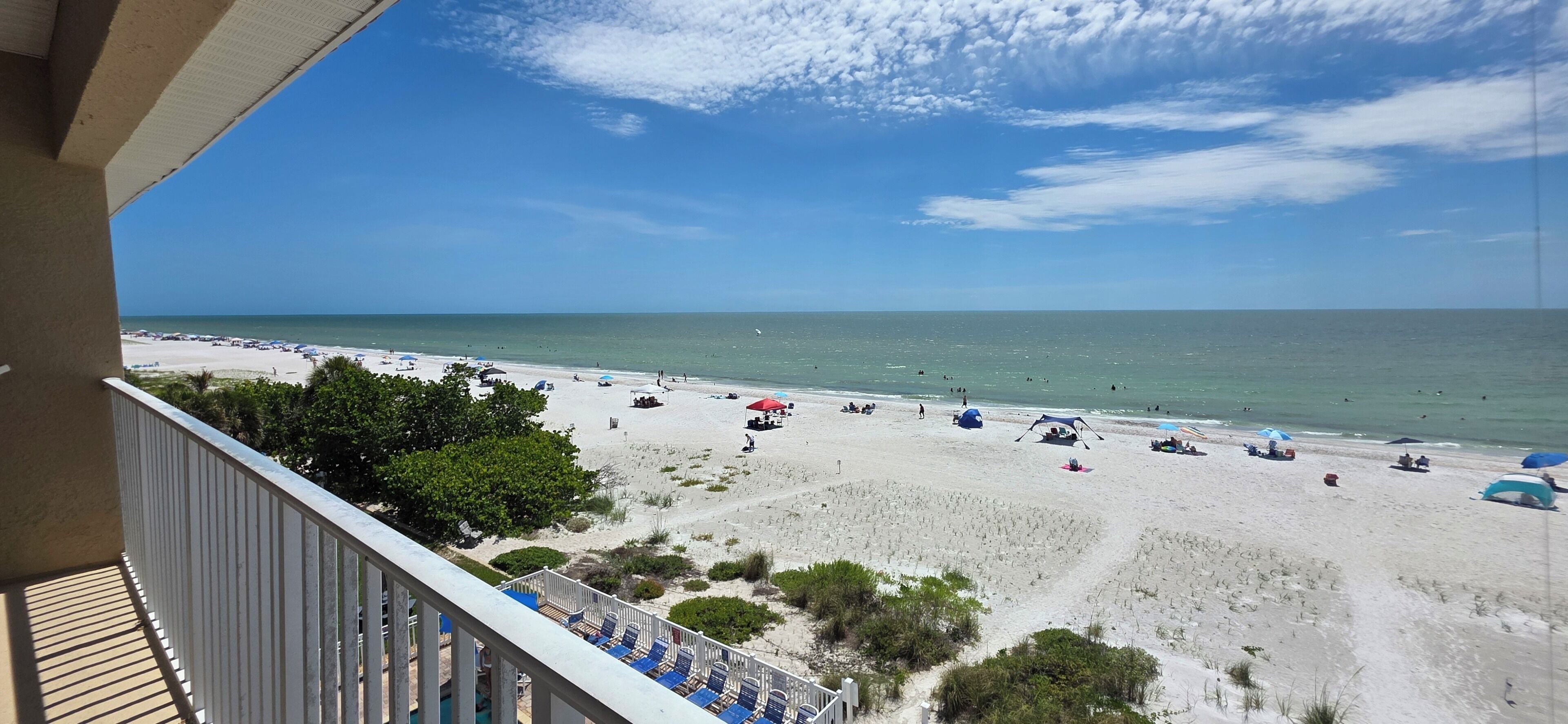 On the beach, sun loungers, beach towels