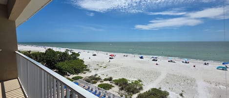 On the beach, sun loungers, beach towels