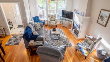 Smart TV, fireplace, books