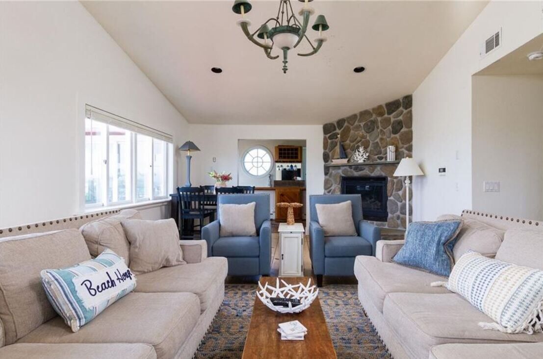 Private beach retreat on 1+ acre and views of ocean!