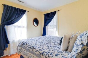 2 bedrooms, desk, blackout drapes, iron/ironing board