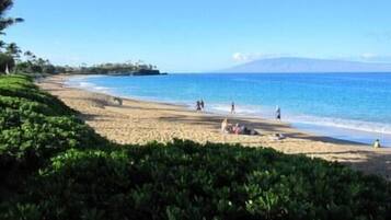On the beach, sun-loungers, beach towels