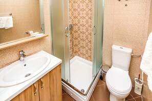 Shower, free toiletries, hair dryer, towels