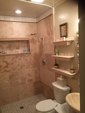 Shower, hair dryer, towels, soap