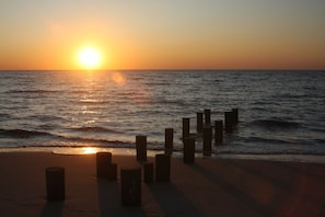 On the beach, sun loungers