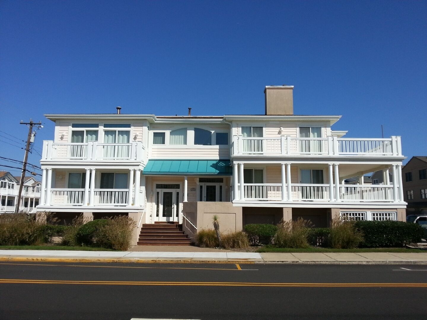 Great Summer Getaway!  Steps to Beach, Ocean views and large wraparound deck