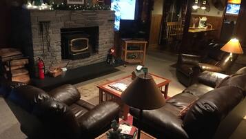 Smart TV, fireplace, DVD player, books