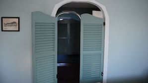 A room with a door featuring a light blue, shingled design. - Short walk to the Beach, sleeps 8, four bedrooms, private patio, 2026 weeks open (Cape May)