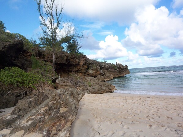 On the beach, sun loungers, beach towels