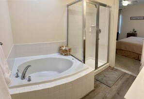 Combined shower/tub, hair dryer, towels, soap
