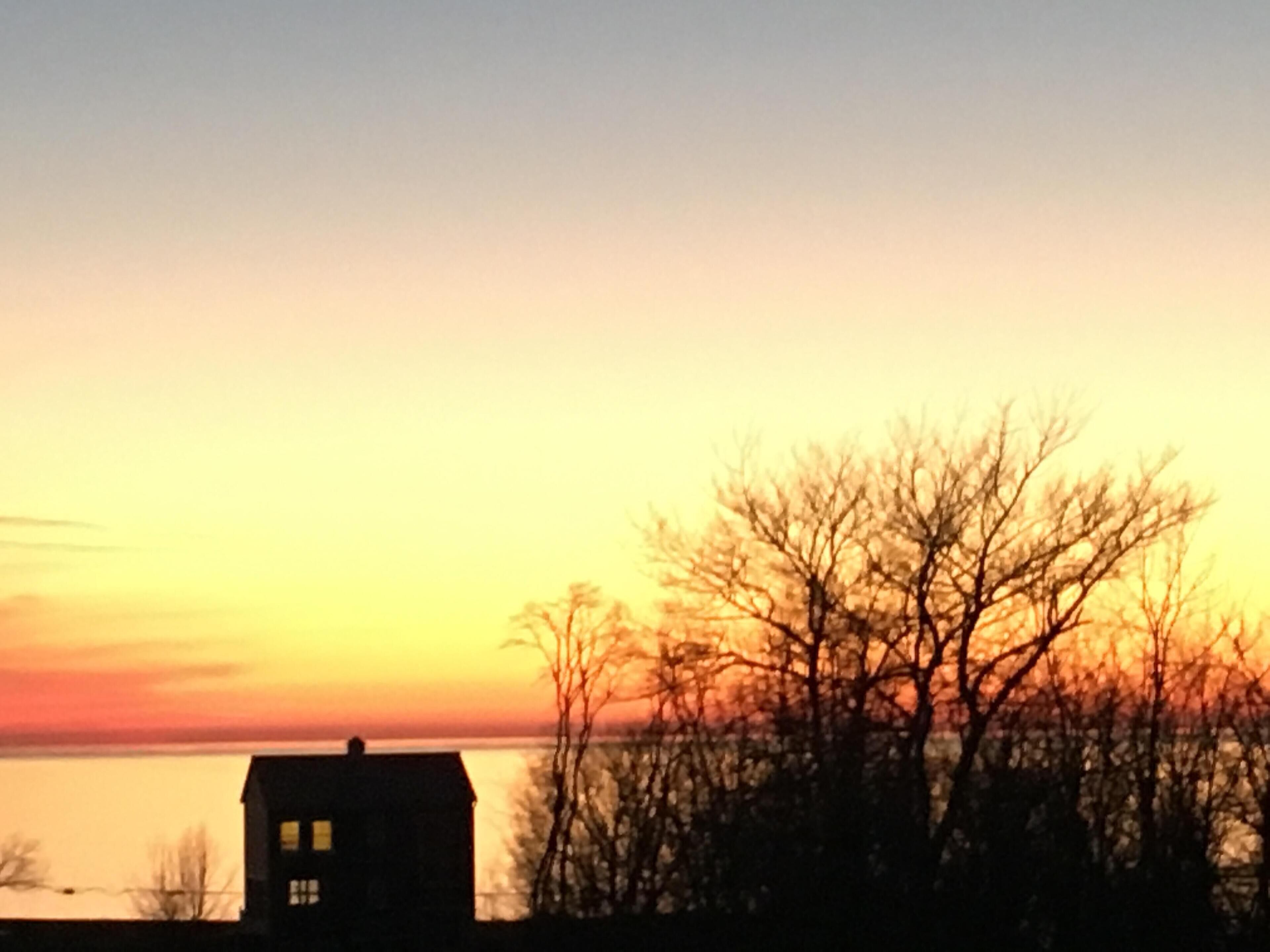 Enjoy spectacular sunsets from high bluff on Lake Michigan!