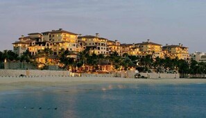 On the beach, sun loungers, beach towels