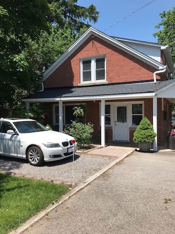 The covered front porch will provide a relaxing place to sit outside if it rains