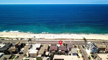 On the beach, sun loungers, beach towels