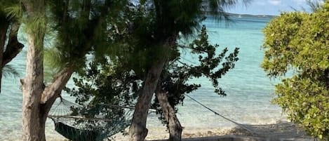 On the beach, sun-loungers, beach towels