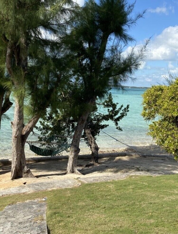 On the beach, sun-loungers, beach towels