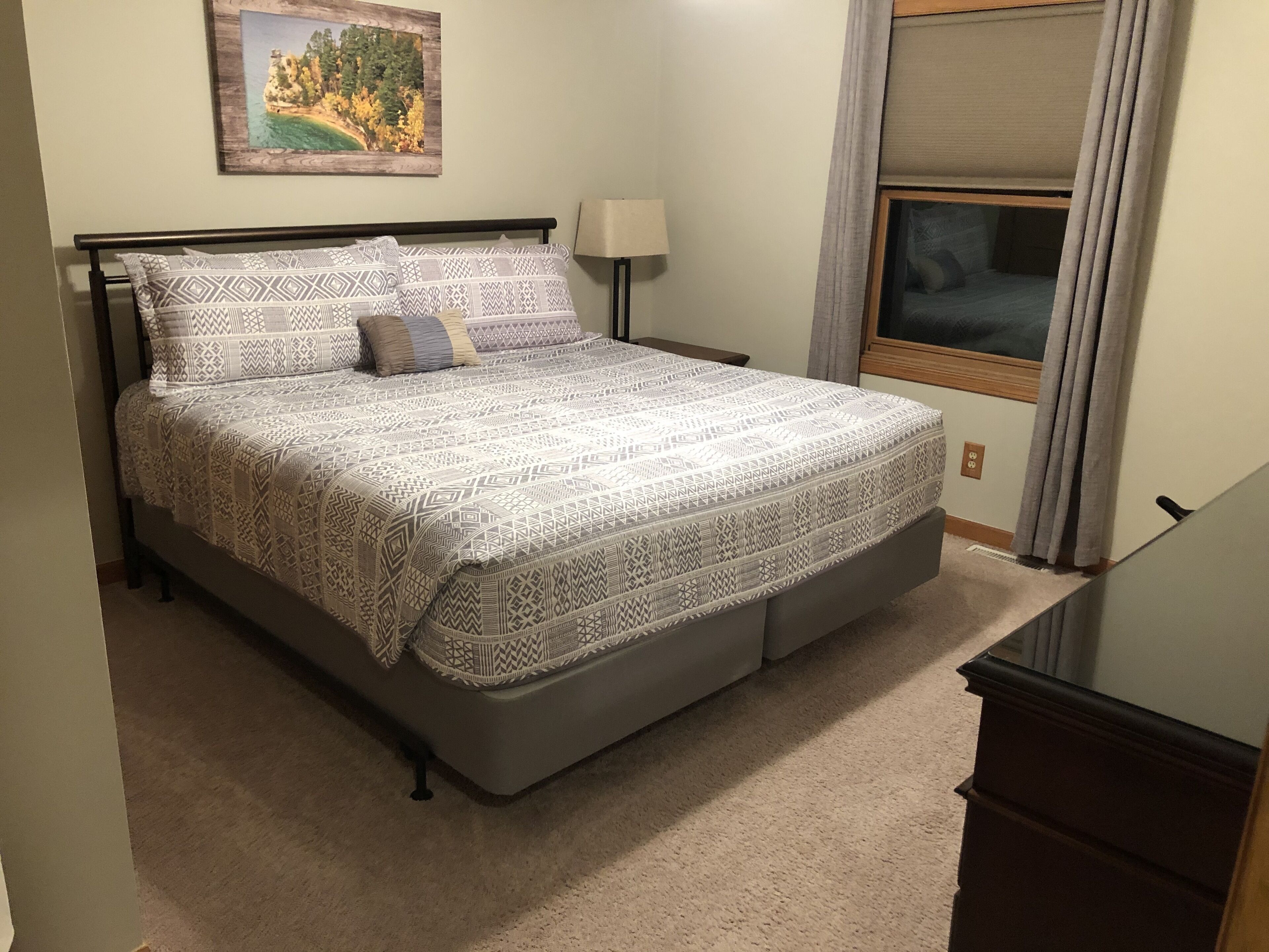 Beautiful 4 bedroom 2 bath home on the Au Train River blocks from the beach